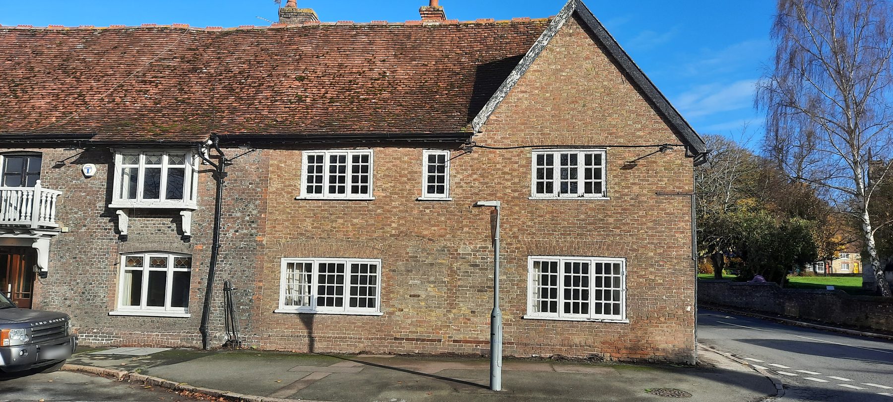 Brick gable and frontage of the Kings Head on the village corner