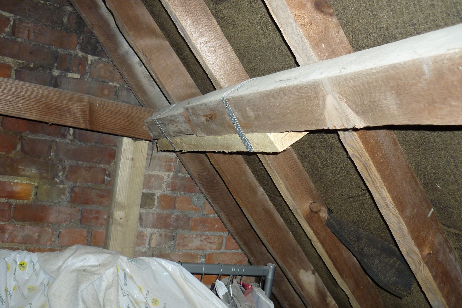 Roof timbers and purlin inside a loft space, photo 1 of 2