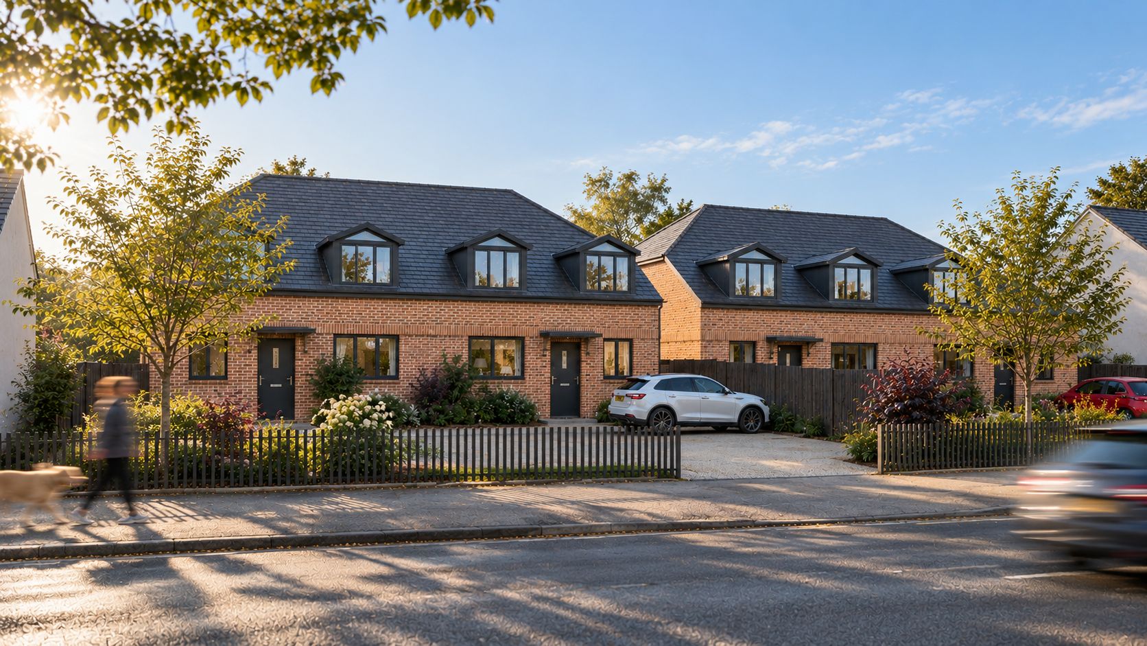 Pair of brick semi-detached houses with dormers in daylight, image 6 of 6